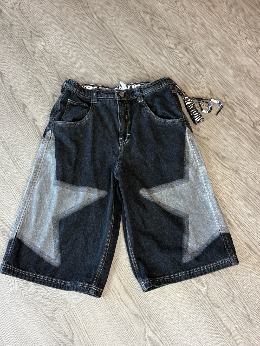 Men's Black Denim Shorts with Bleached Star Panels